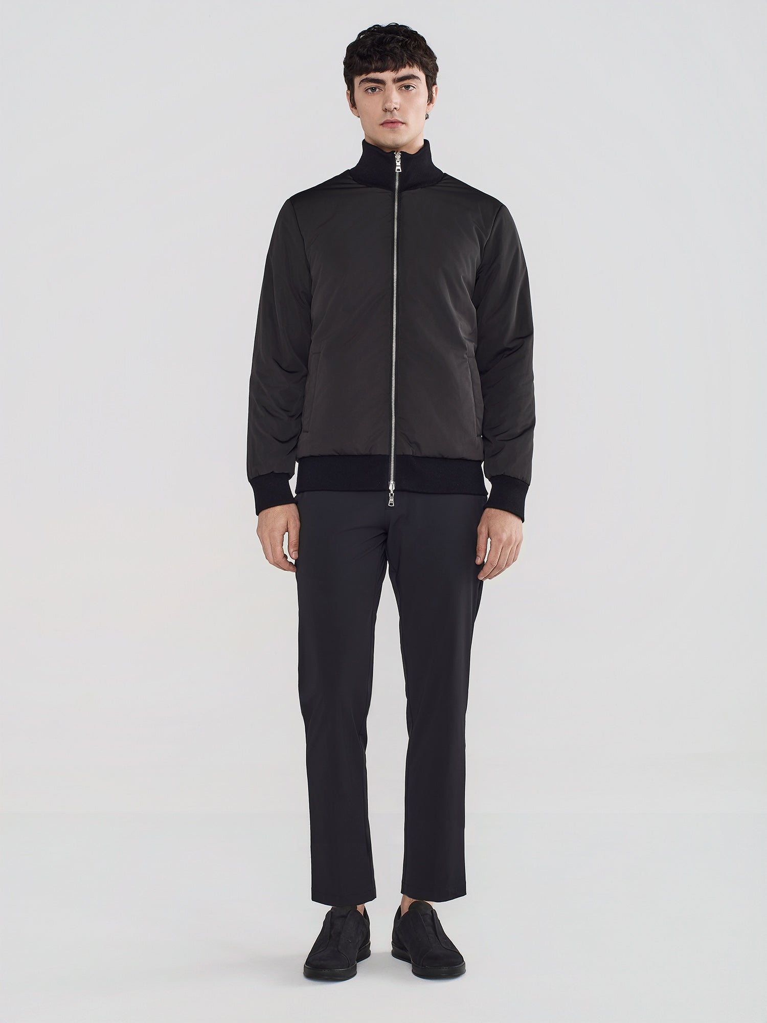 REVERSIBLE BOMBER IN NYLON AND KNIT