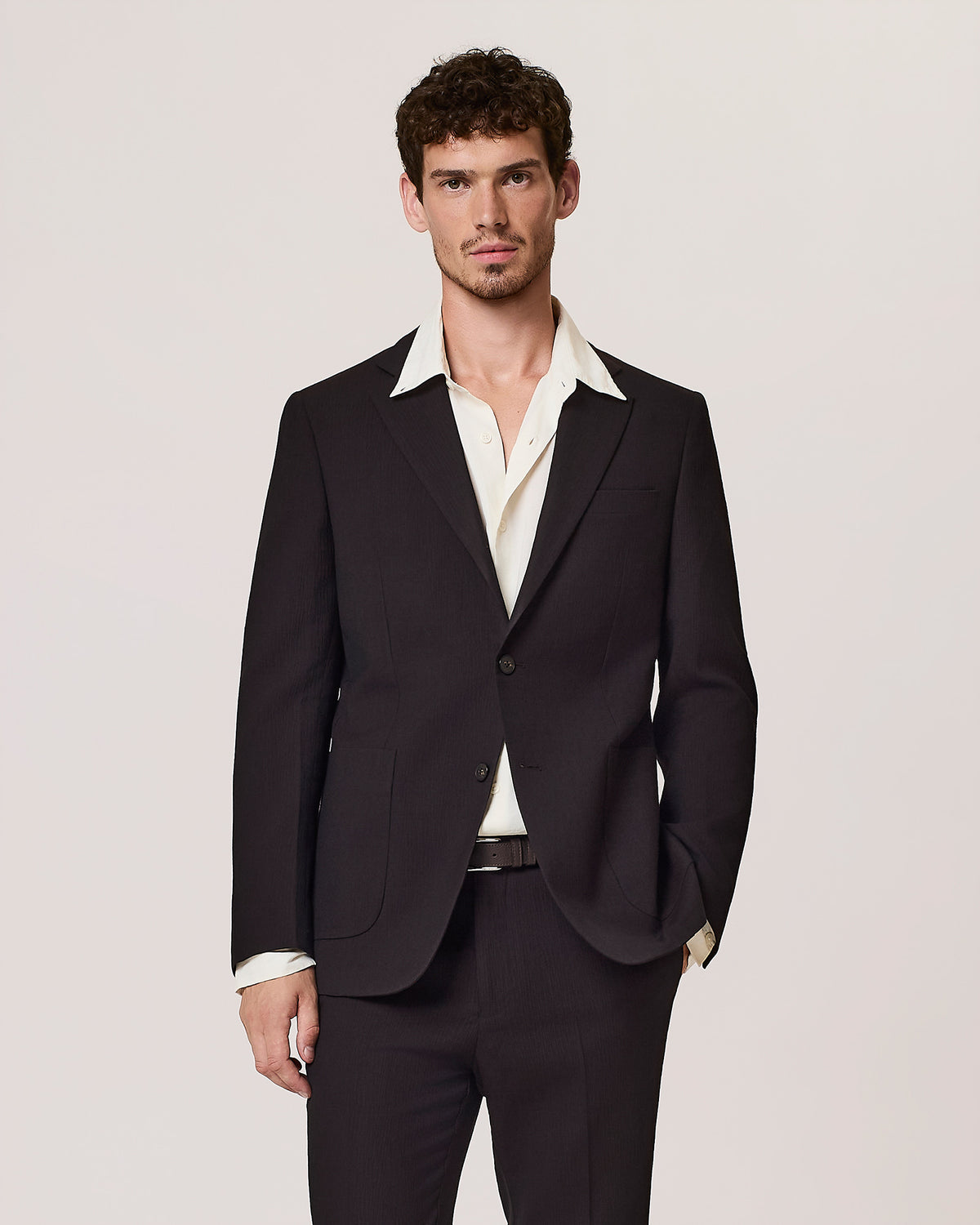 Single-breasted pleated wool blend suit jacket