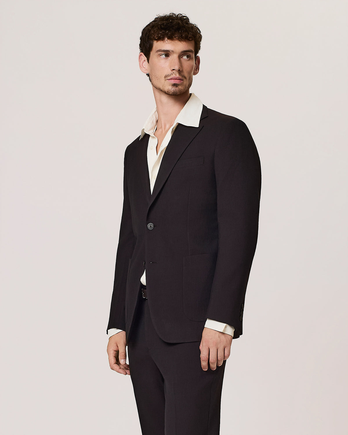 Single-breasted pleated wool blend suit jacket