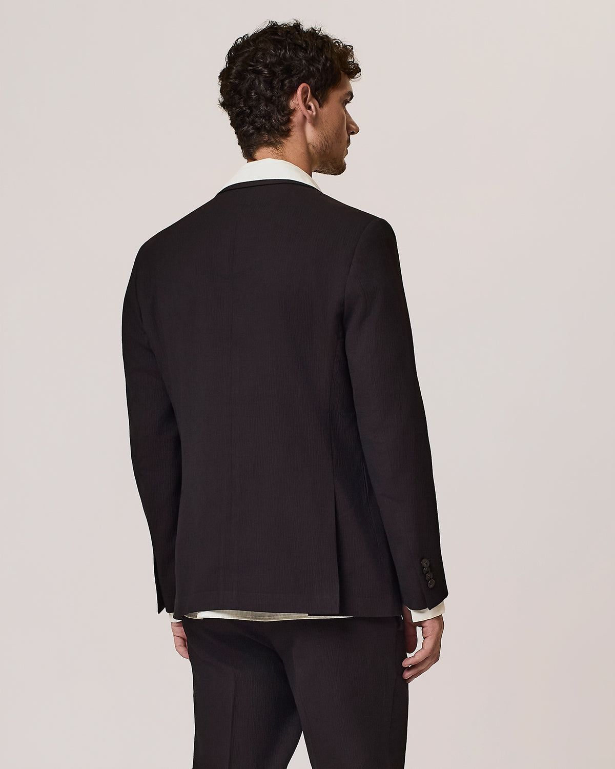 Single-breasted pleated wool blend suit jacket