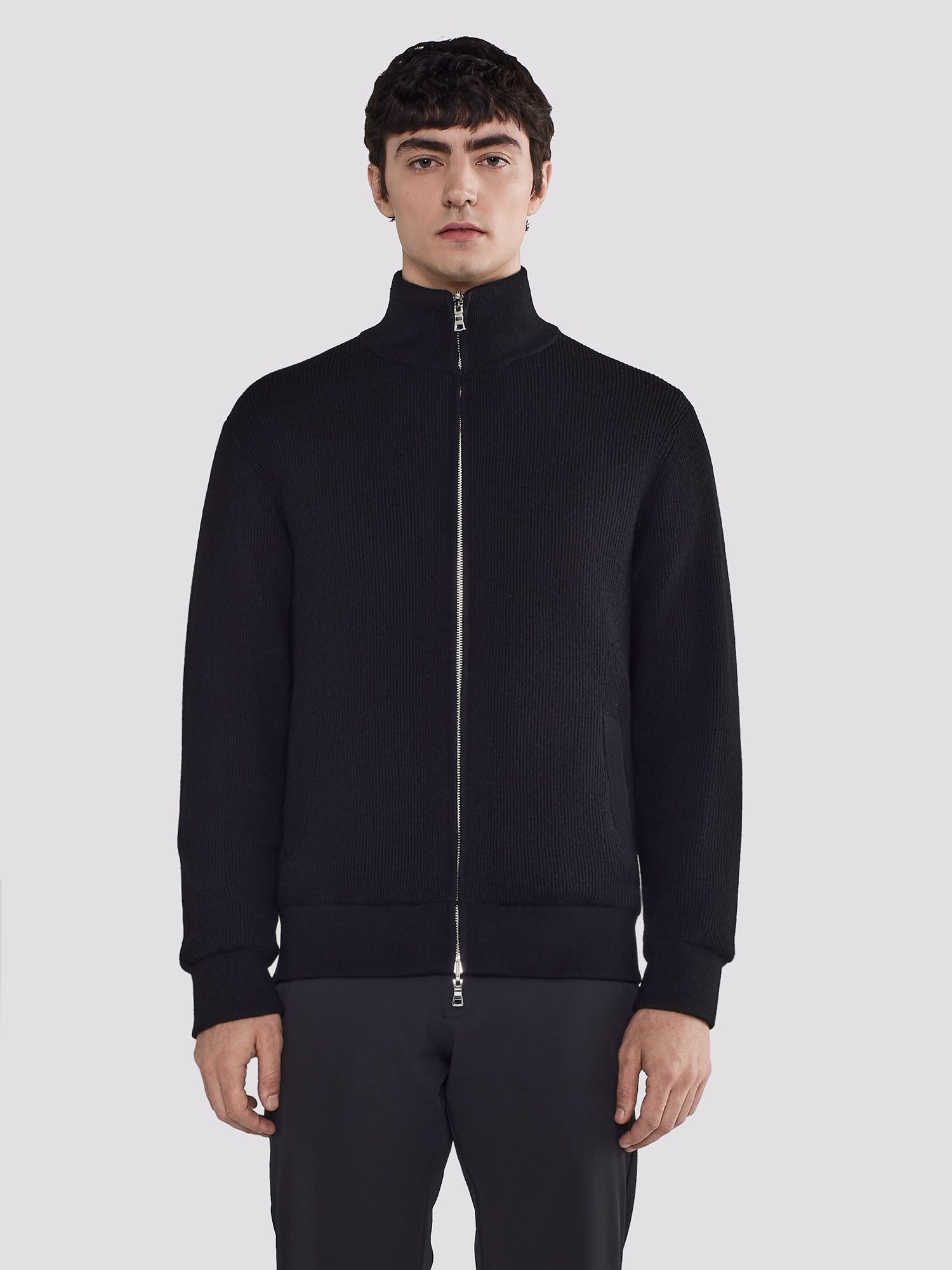 REVERSIBLE BOMBER IN NYLON AND KNIT