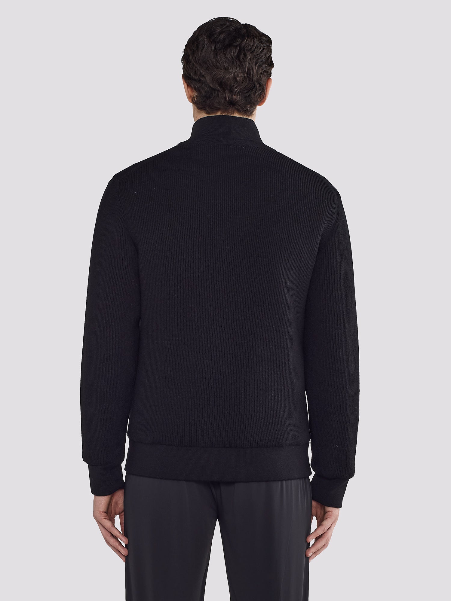 REVERSIBLE BOMBER IN NYLON AND KNIT