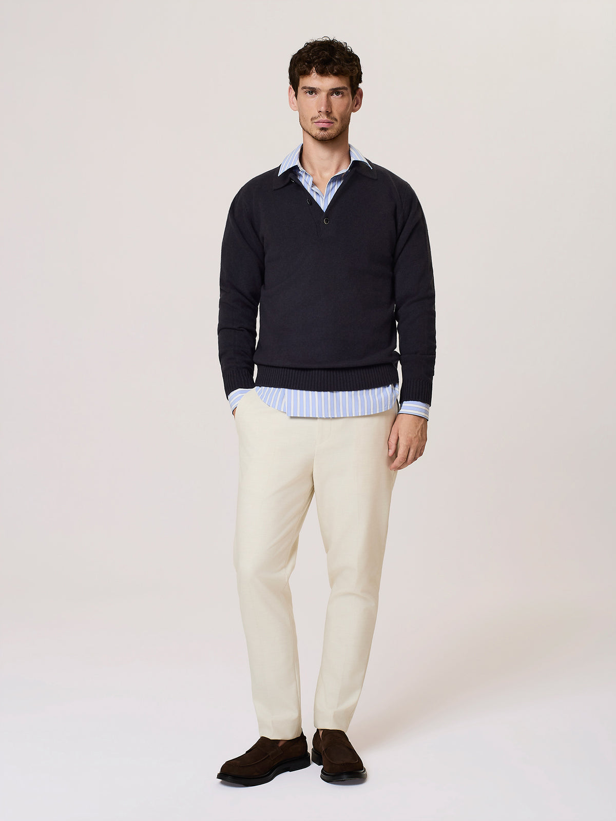 Polo in lana merino con scollo a v