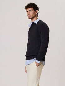Polo in lana merino con scollo a v