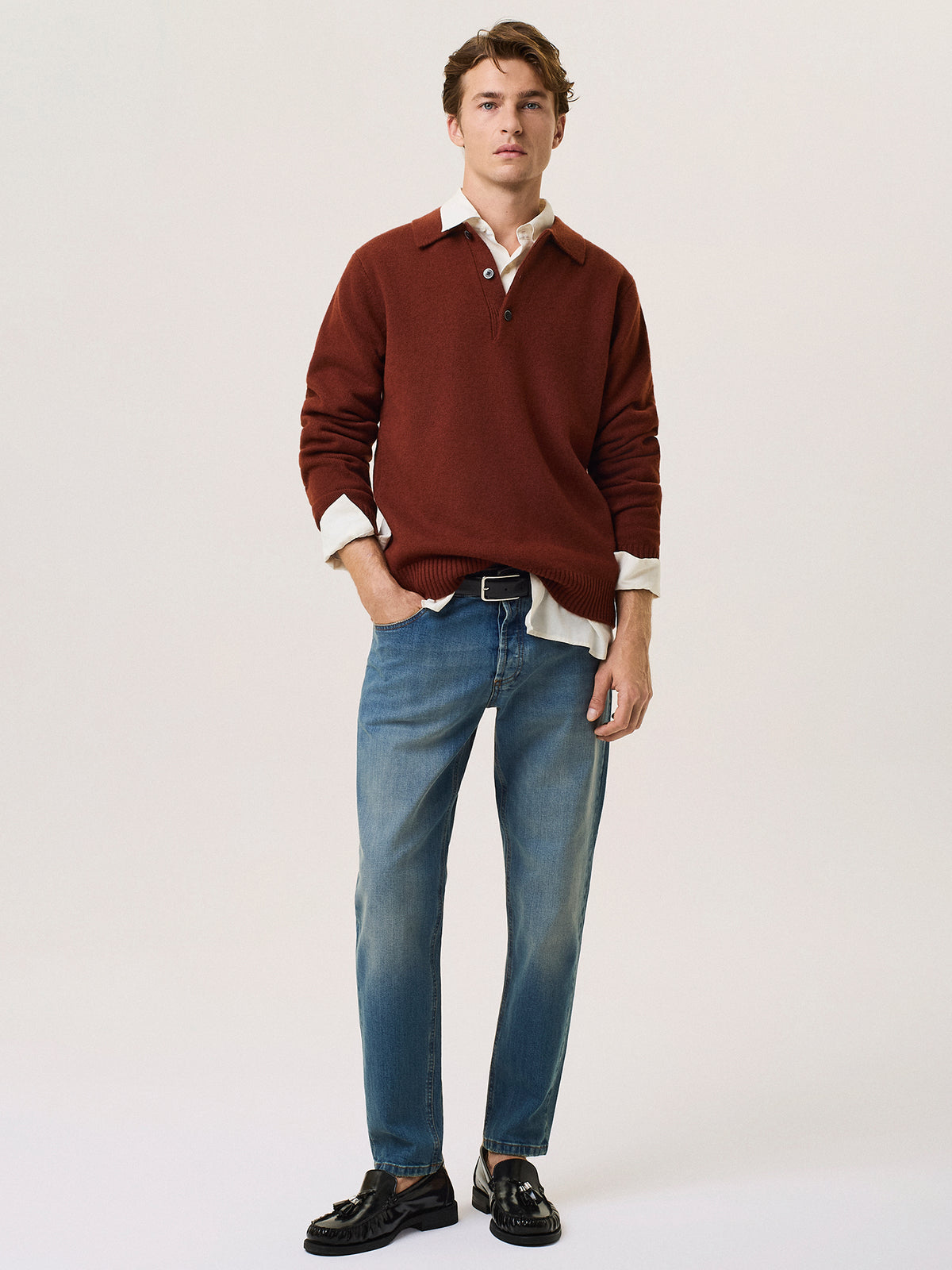 Polo in lana merino con scollo a v