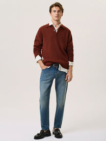 Polo in lana merino con scollo a v