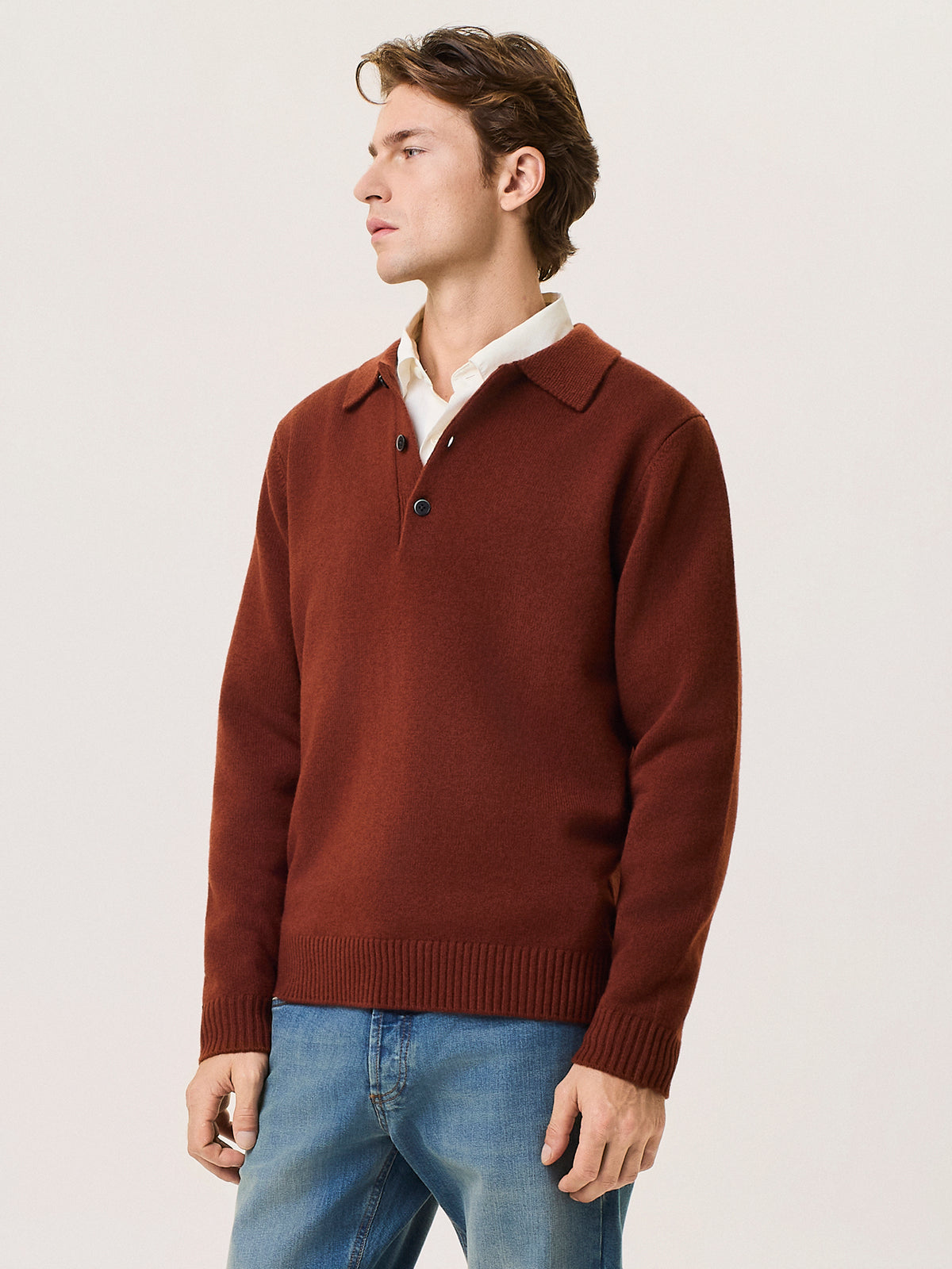 Polo in lana merino con scollo a v
